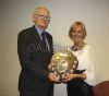 Bridget Scally-Millar receives the Hugh O Hara Memorial Shield from Danial OHara